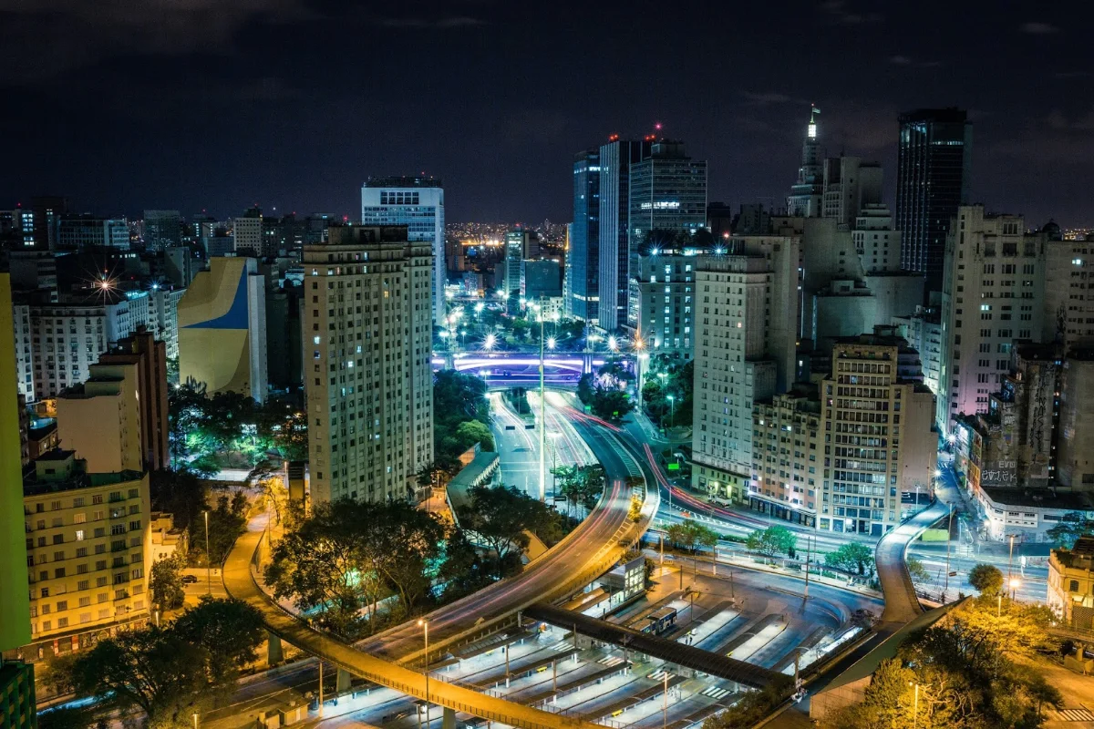 BMNS - Cityscape View of Illuminated Buildings at Night
