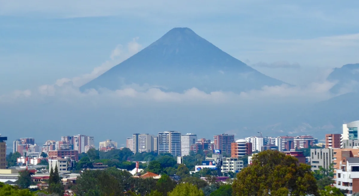 BMNS - Scenic view of city with mountain in the background