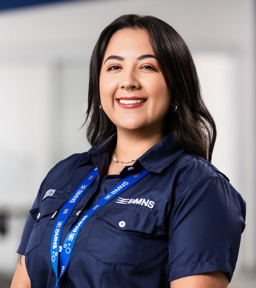 BMNS - Smiling Professional Woman in Blue Uniform Shirt